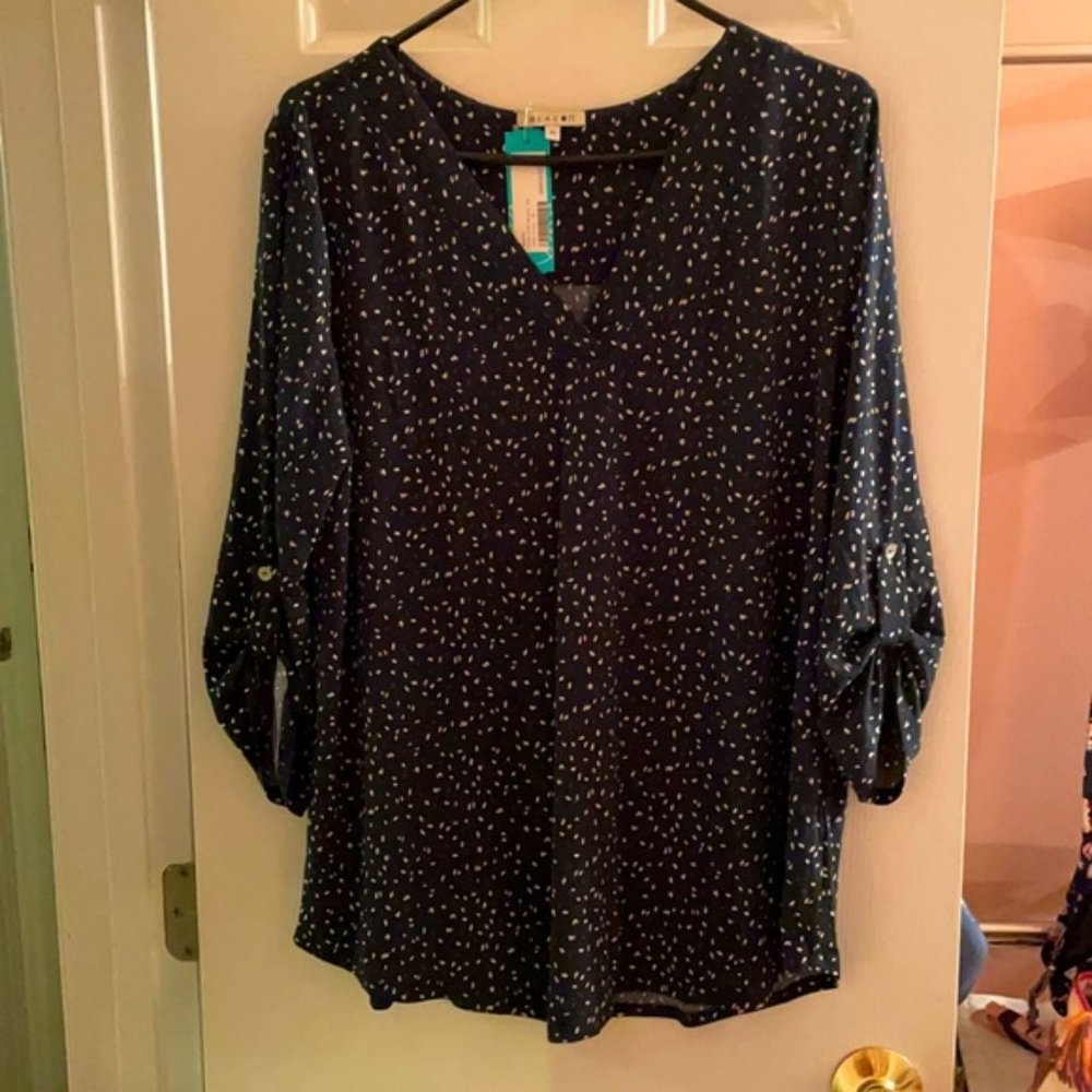 Patty Roll Tab Knit Top